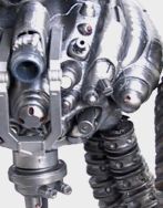 Detail of a model's mechanical torso with nozzle-like openings